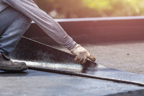 Professional Basement Waterproofing technician working in Luna Pier, MI